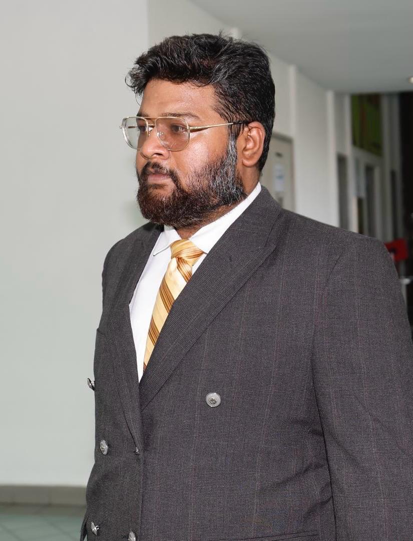 Sivahnanthan Ragava, a criminal lawyer specializing in Section 39B drug trafficking cases in Kuala Lumpur and Selangor, standing in front of the Malaysian High Court.
